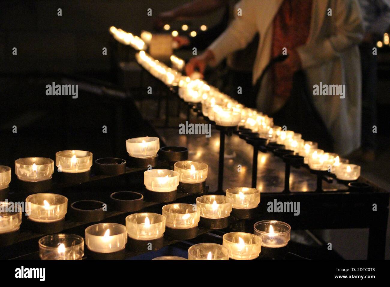 Lit Tea Light Candles On Altar Stock Photo Alamy