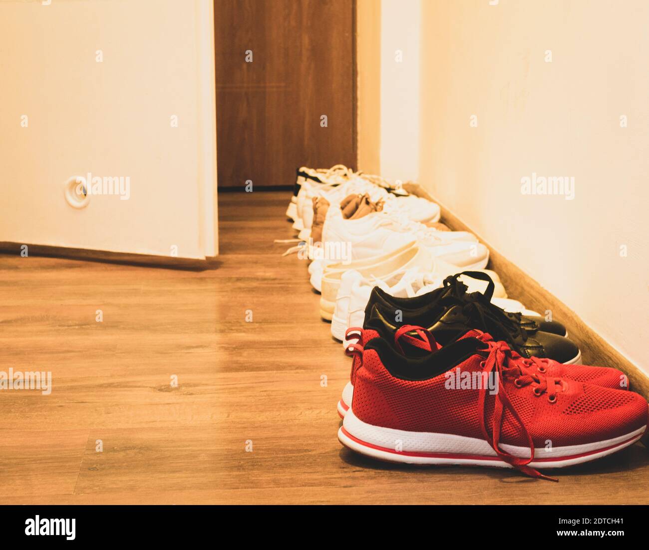 Shoes by front door wood floor hires stock photography and images Alamy