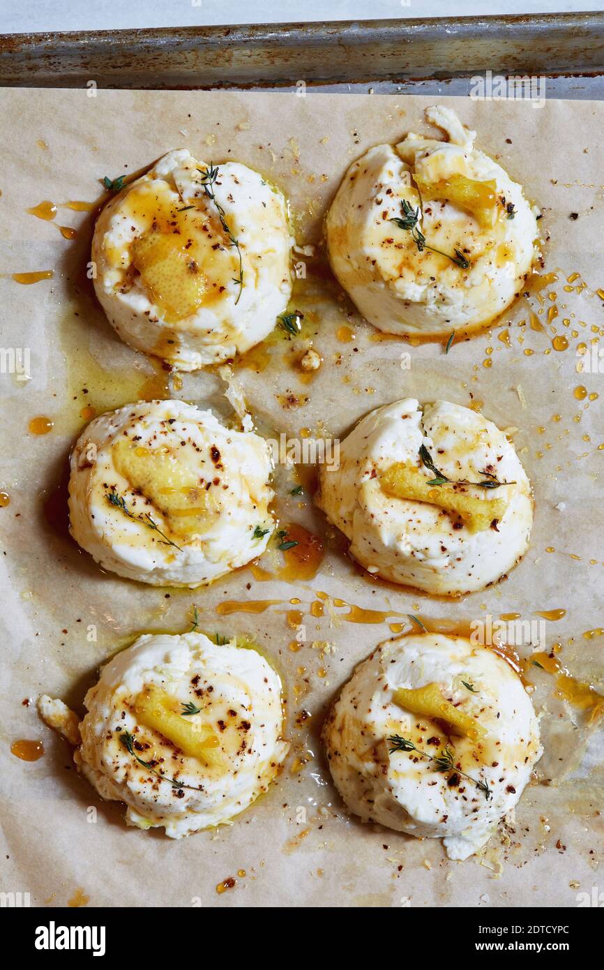 Baked ricotta cheese on baking sheet Stock Photo Alamy