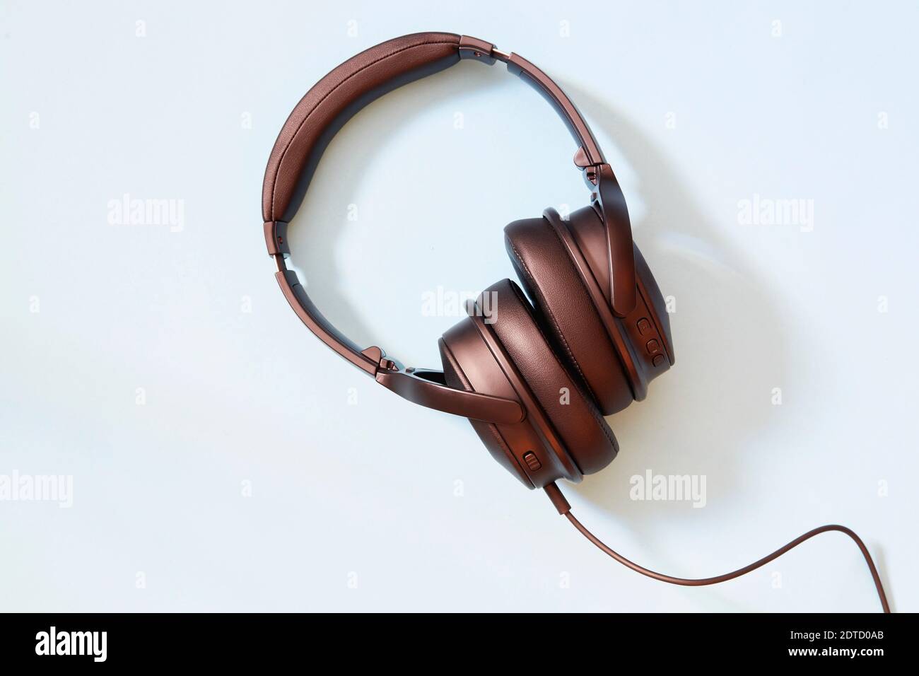 Headphones on blue background Stock Photo