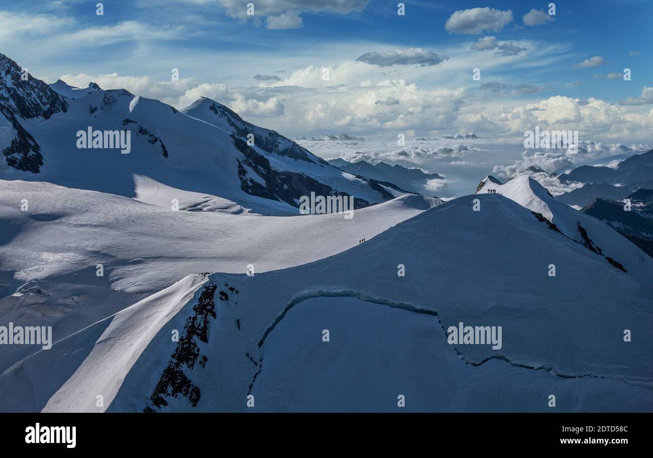 Switzerland, Monte Rosa, Climbers on mountain ridge at Monte Rosa ...