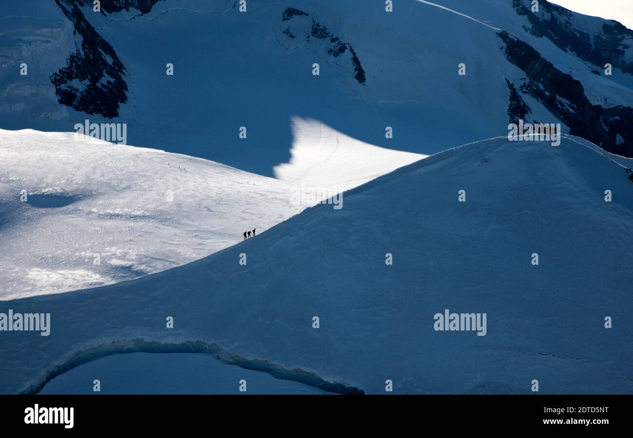 Switzerland, Monte Rosa, Climbers on mountain ridge at Monte Rosa ...