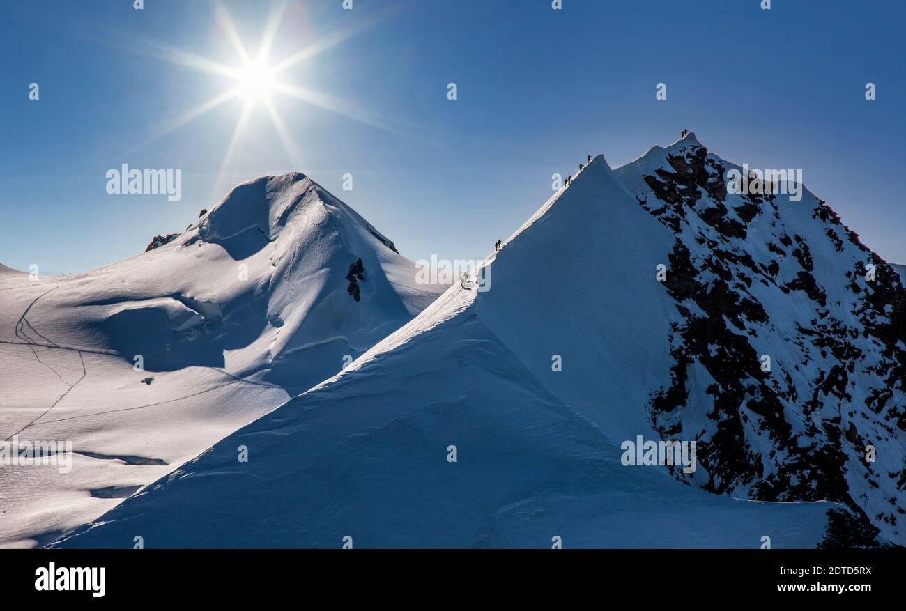 Switzerland, Monte Rosa, Climbers on mountain ridge at Monte Rosa ...