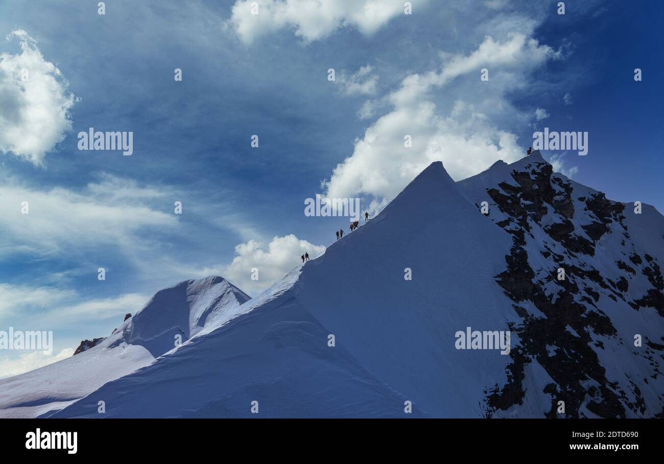 Switzerland, Monte Rosa, Climbers on mountain ridge at Monte Rosa ...