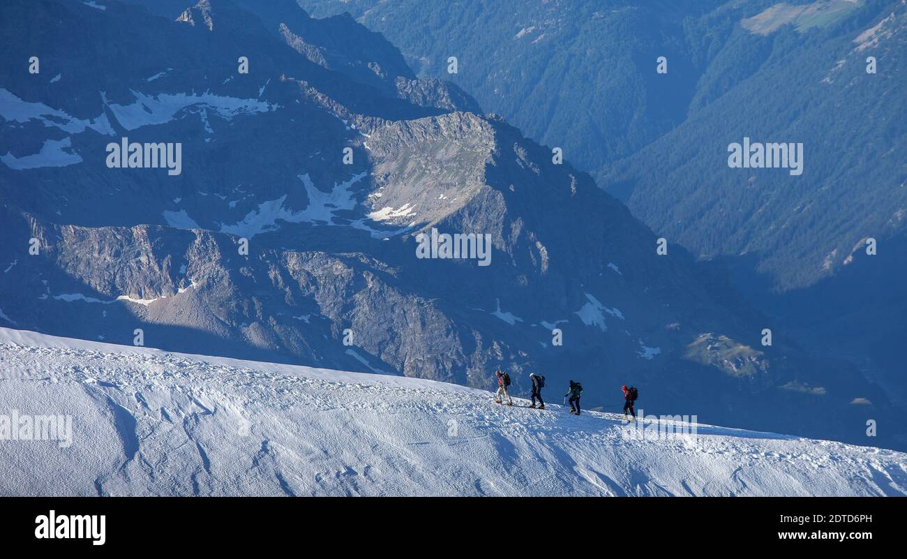 Switzerland, Monte Rosa, Climbers on mountain ridge at Monte Rosa ...