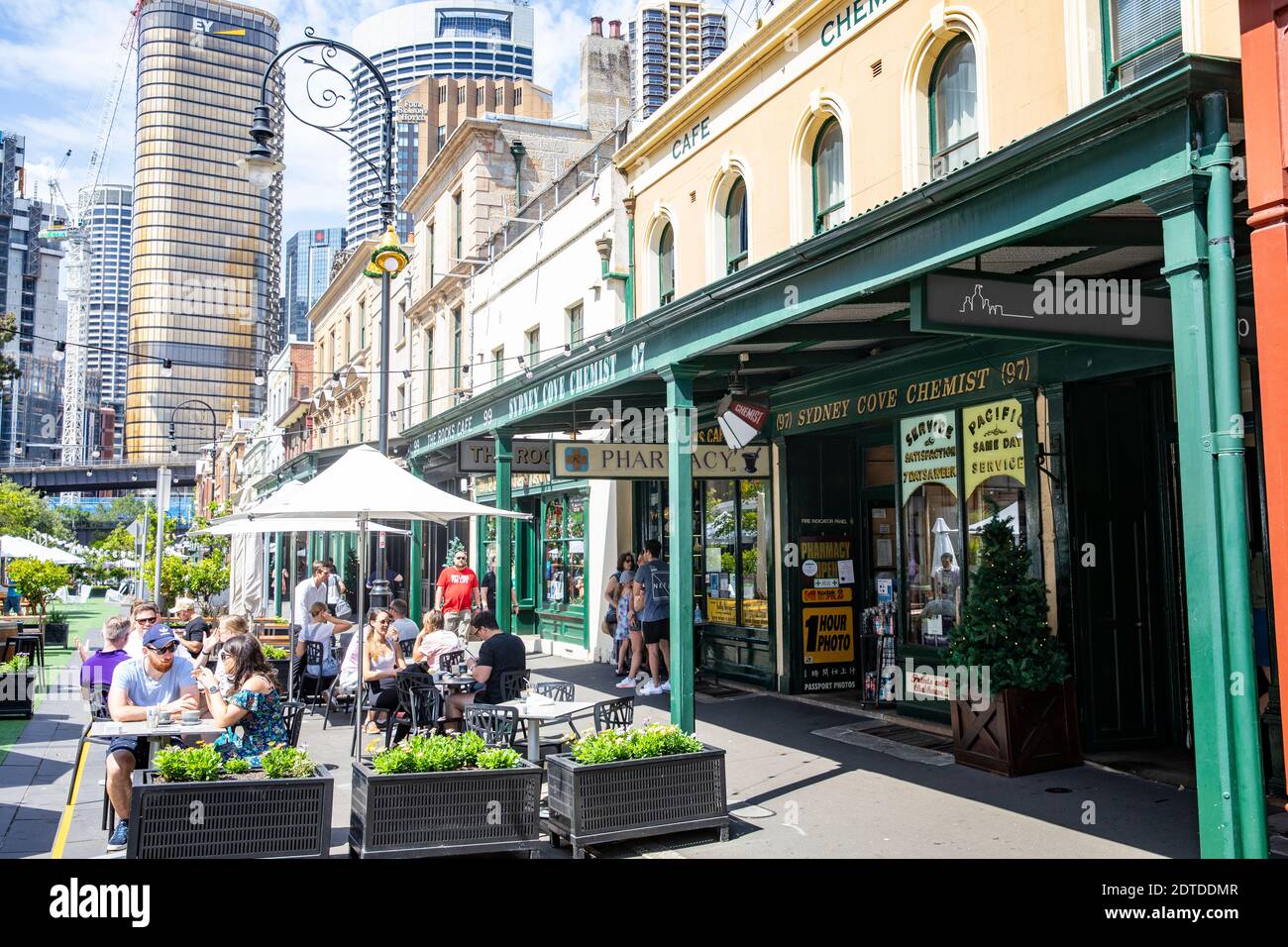 Sydney The Rocks cafe and high rise office buildings a contrast of old ...