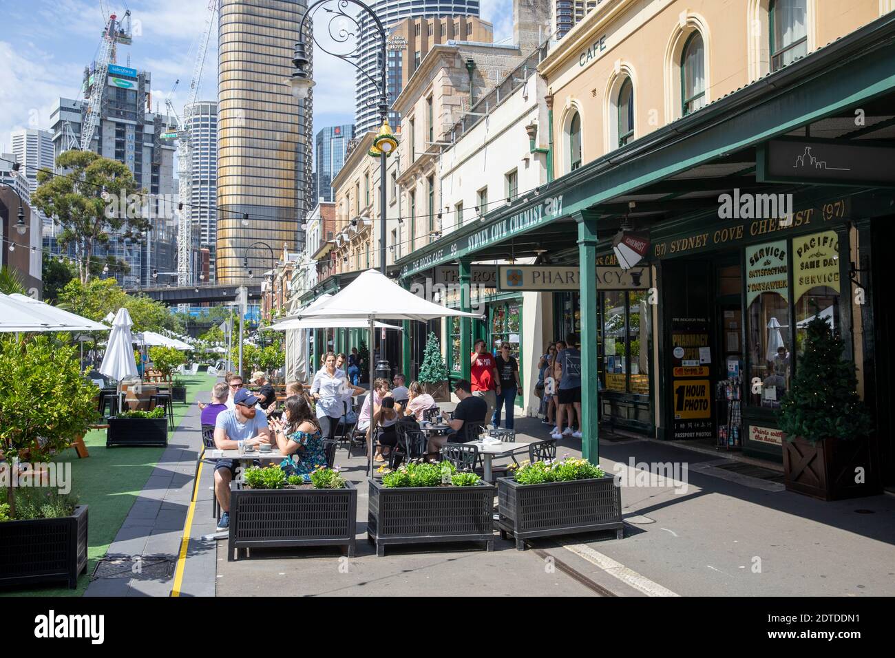 The Rocks Sydney local cafe and view of the skyscrapers and office ...