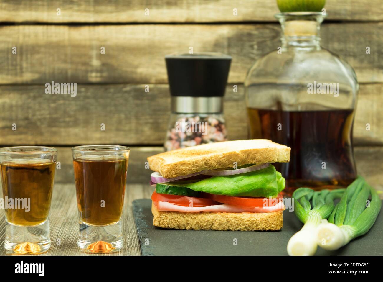 A Sandwich And A Glass Of Homemade Vodka Sandwich And Home Made Whiskey For A Quick Bite 3720