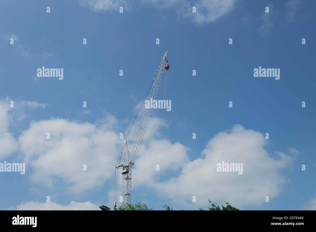 Jumping jumping from a tower crane. Jump from a construction crane