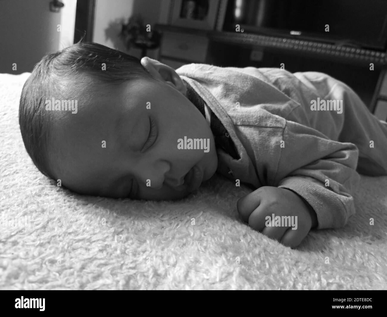 Cute Baby Sleeping On Bed At Home Stock Photo Alamy