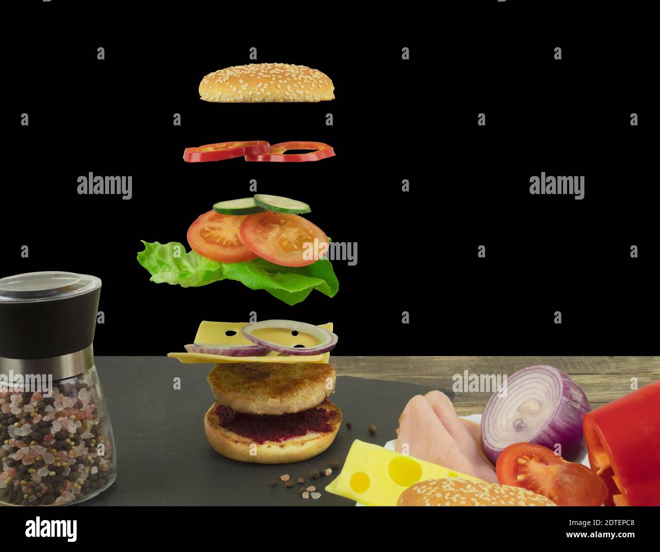 Flying cheeseburger on an isolated background Stock Photo Alamy