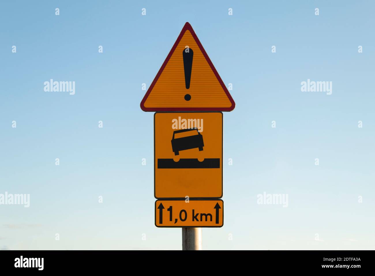 Road sign rough road and exclamation mark Stock Photo