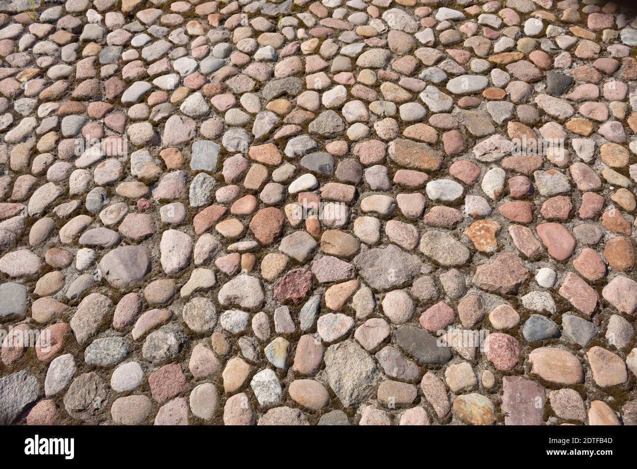 Round cobblestones hi-res stock photography and images - Alamy