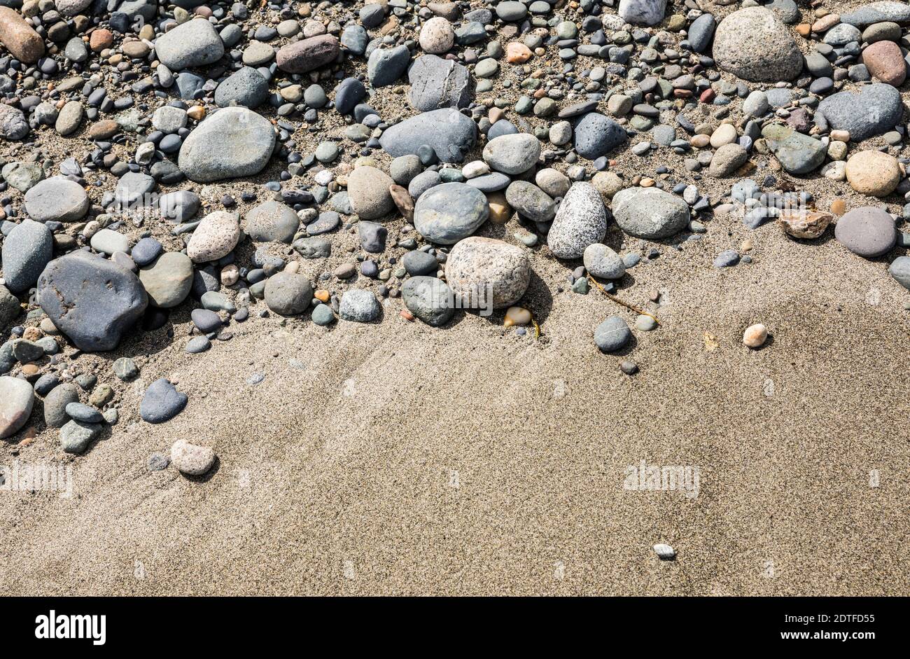 Small rocks and stones on a sandy beach, Deception Pass State Park,  Washington, USA Stock Photo - Alamy