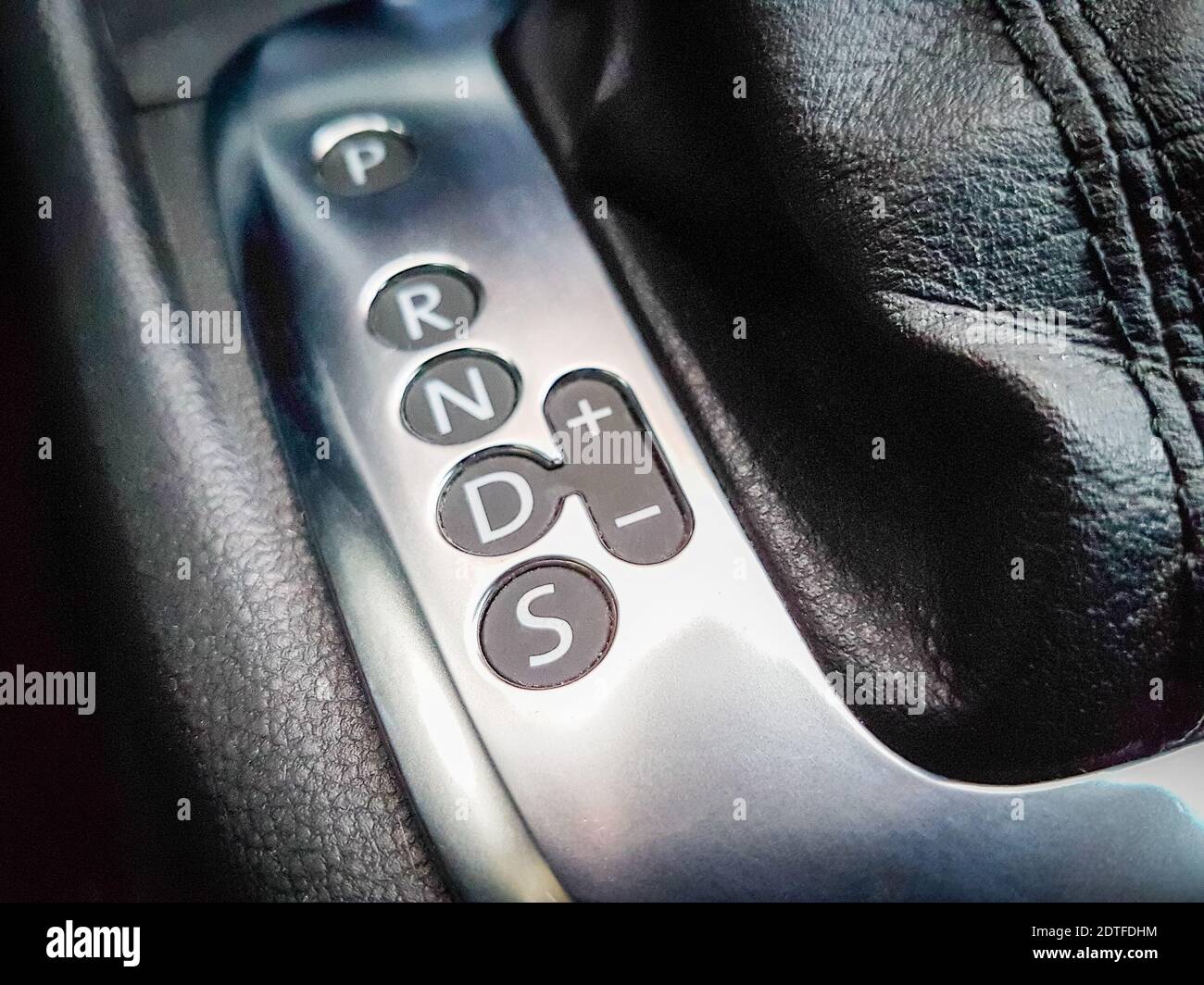 Icon near a floor selection lever of car with automatic transmission