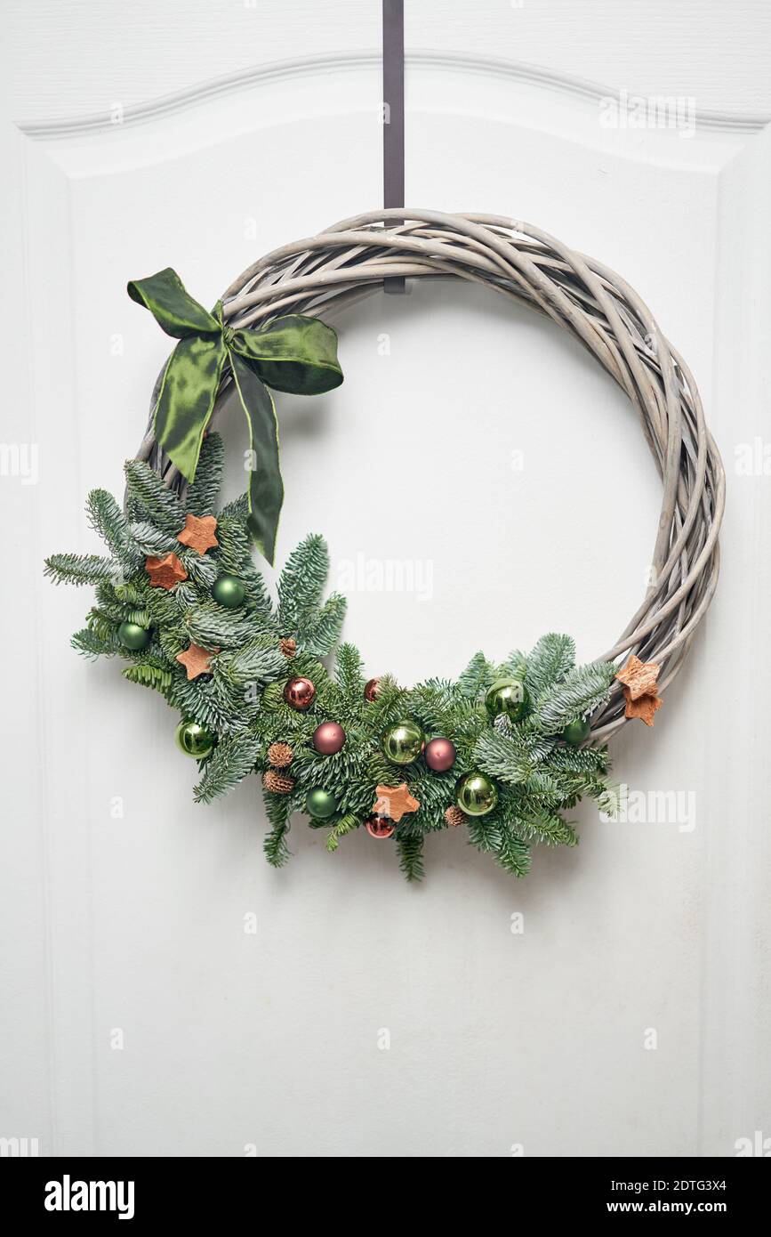 Christmas wreath loop decorated fir branches and christmas toys for the holiday. The new year celebration. European flower shop Stock Photo