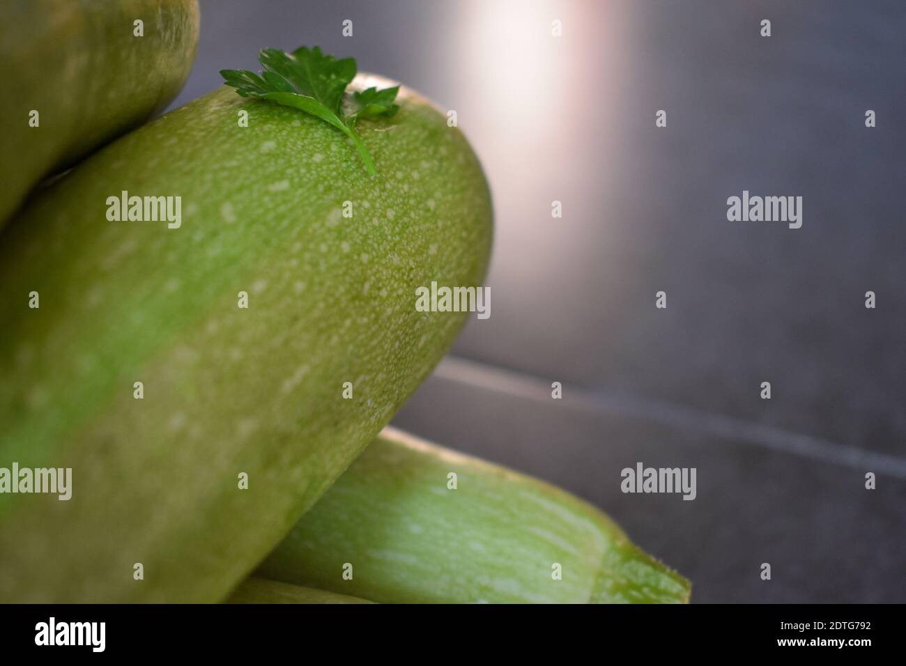 Parsley leaf on zucchini Stock Photo Alamy