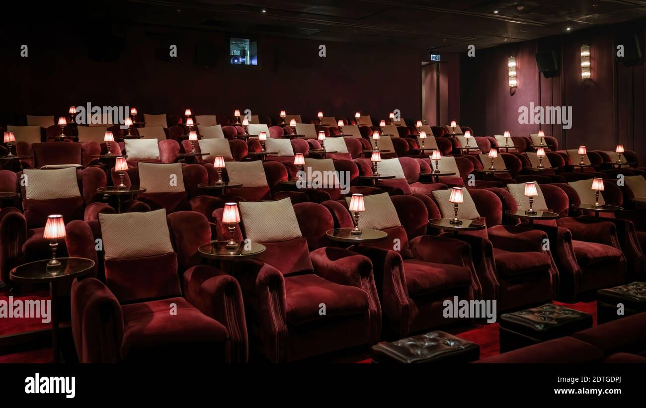 VIP cinema theatre with chairs seating in a luxury interior with moody  athmosphere Stock Photo - Alamy