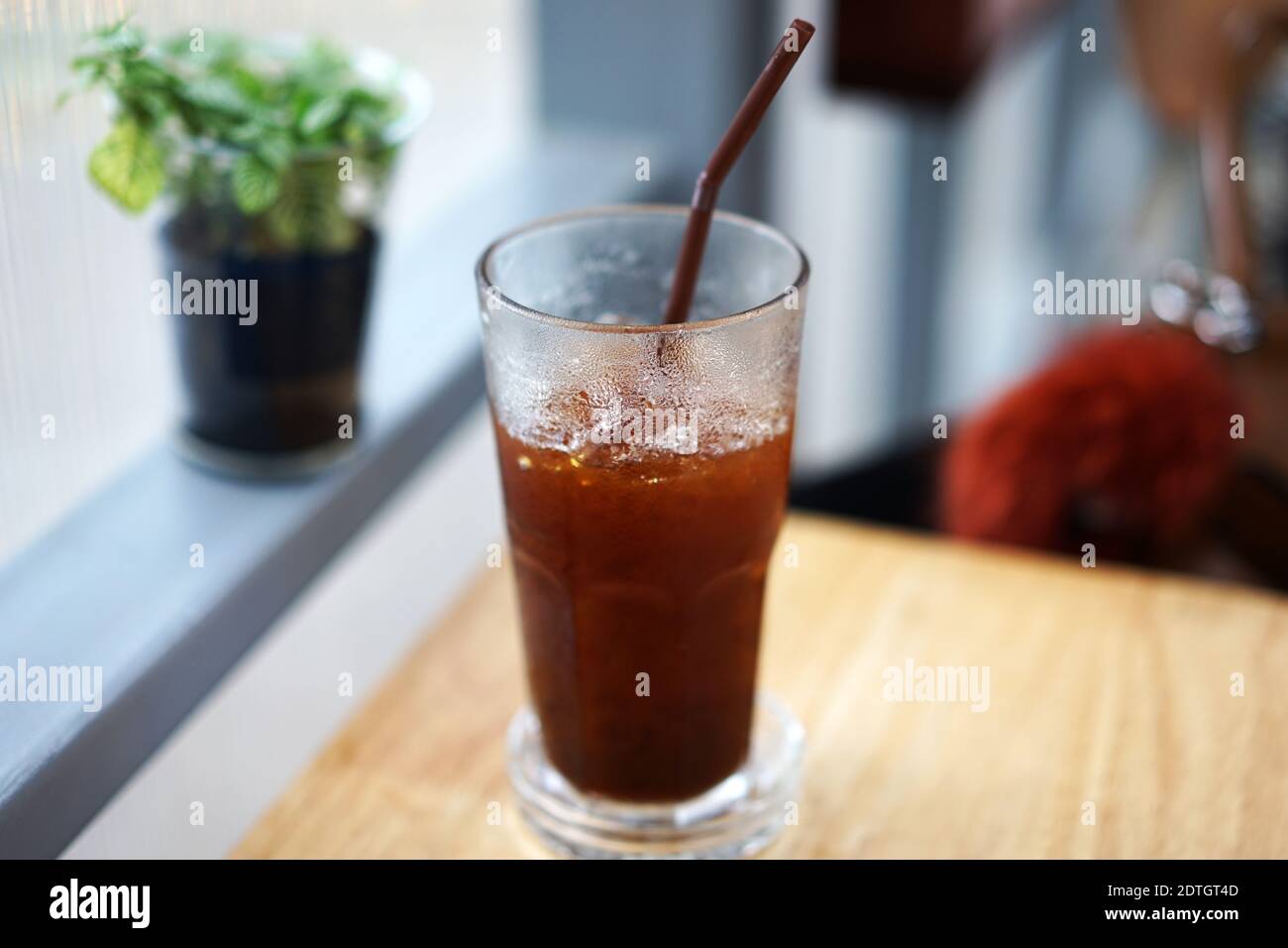 Iced americano in plastic container hi-res stock photography and images ...