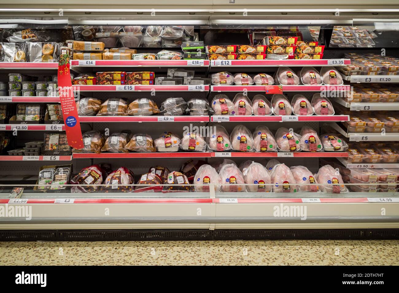London, UK. 22nd Dec, 2020. Christmas: Fully stocked Turkey aisle in Tesco supermarket just prior to morning opening time. Dozens of Tesco, Asda and Waitrose customers have had their online turkey orders cancelled due to a “technical glitch” just days before Christmas. Credit: Guy Corbishley/Alamy Live News Stock Photo