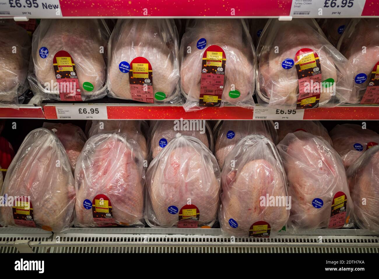 London, UK. 22nd Dec, 2020. Christmas: Fully stocked Turkey aisle in Tesco supermarket just prior to morning opening time. Dozens of Tesco, Asda and Waitrose customers have had their online turkey orders cancelled due to a “technical glitch” just days before Christmas. Credit: Guy Corbishley/Alamy Live News Stock Photo