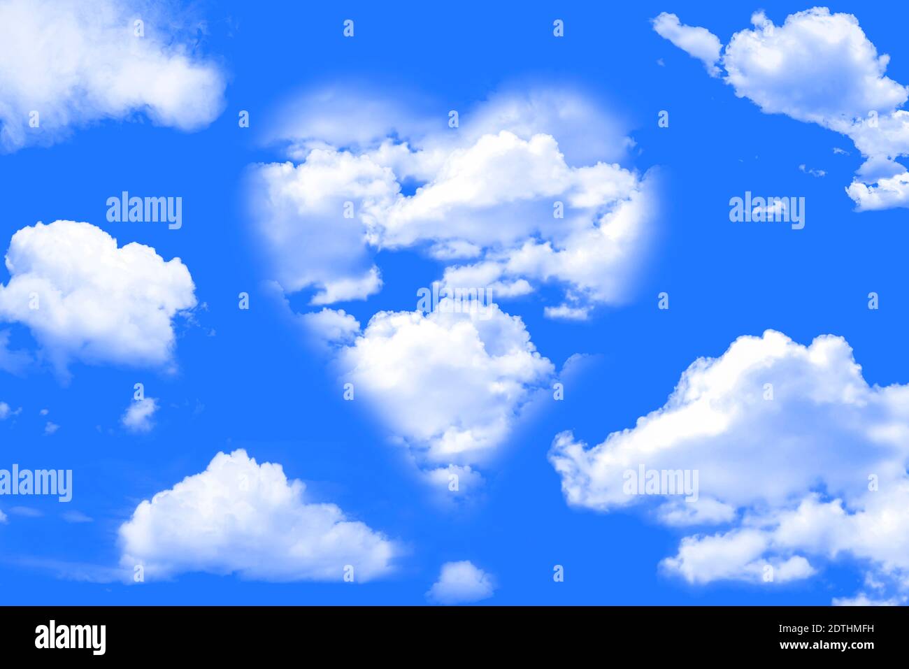 Heart shaped cloud formation on a blue sky day concept Stock Photo