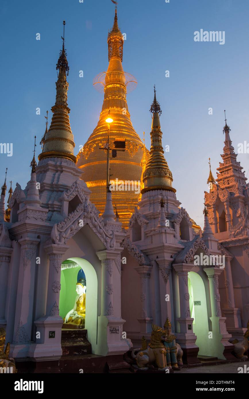 A Buddha shrine at the Shwedagon Pagoda in Yangon (Rangoon) in Myanmar (Burma) Stock Photo