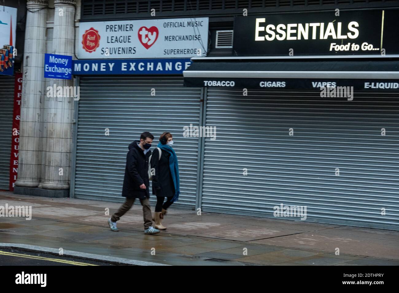 London- December,2020: Closed shops and quiet streets of people wearing masks in London’s West End during Tier 4 Coronavirus lockdown Stock Photo