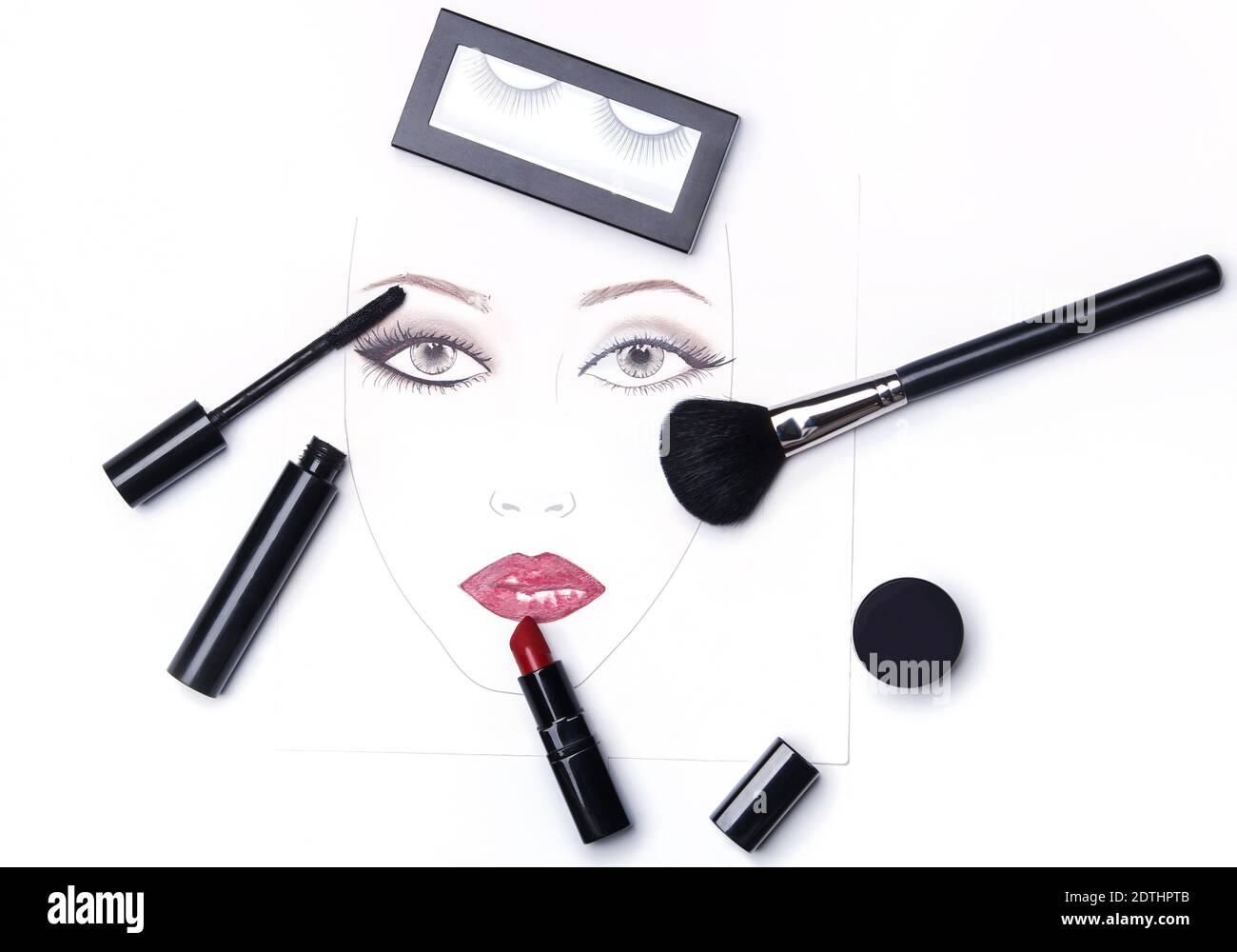 Face chart and different makeup objects and cosmetics on white background Stock Photo