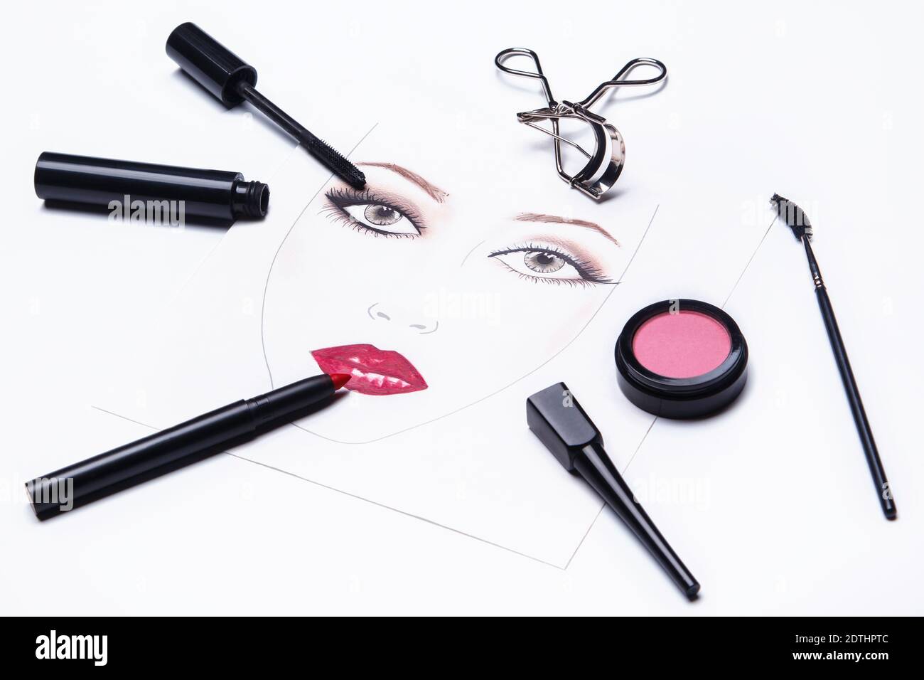 Face chart and different makeup objects and cosmetics on white background Stock Photo