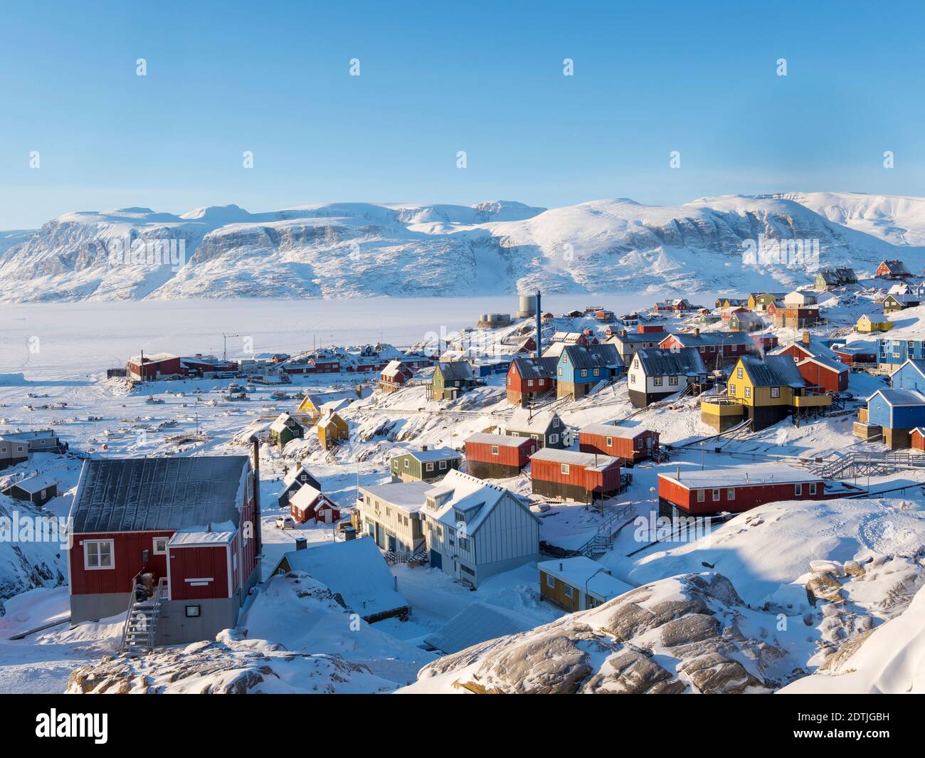 Town Uummannaq during winter in northern Greenland. Background is Nussuaq (Nugssuaq) peninsula. America, North America, Denmark, Greenland Stock Photo