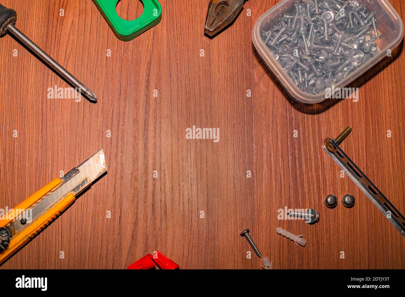 layout for the carpenter. On a wooden surface, working tools in a