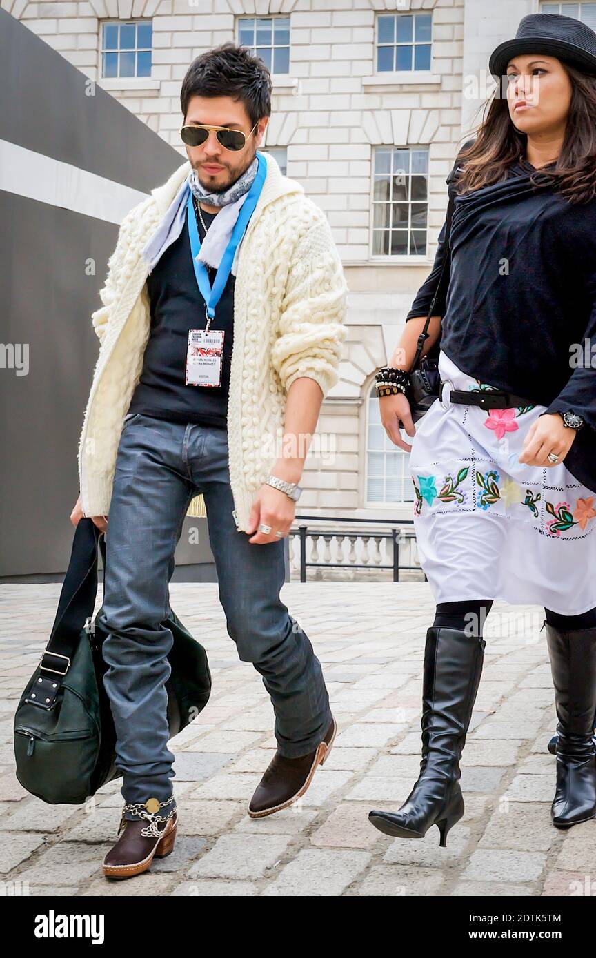 A real cross section of different fashion workers arrive to take part in the fashion shows at the 2009 London Fashion Week held at Somerset House. Stock Photo