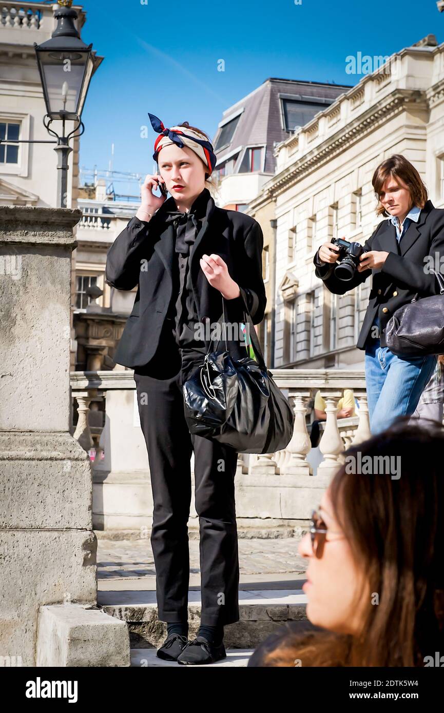 A real cross section of different fashion workers arrive to take part in the fashion shows at the 2009 London Fashion Week held at Somerset House. Stock Photo