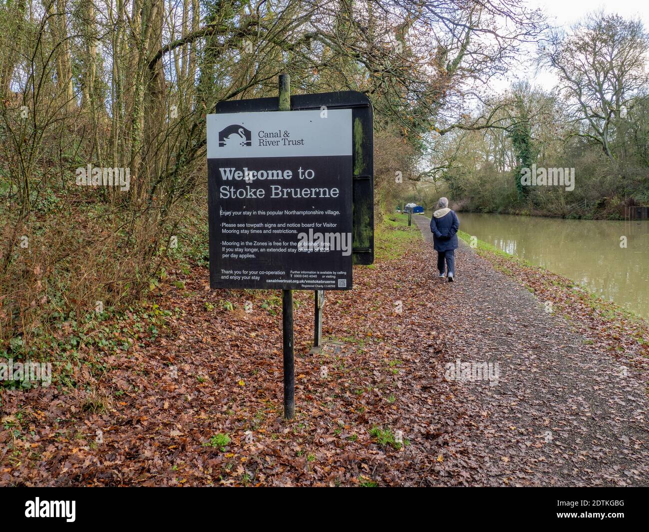 Welcome To Stoke Bruerne, a Canal & River Trust sign on the canal towpath, Northamptonshire, UK Stock Photo