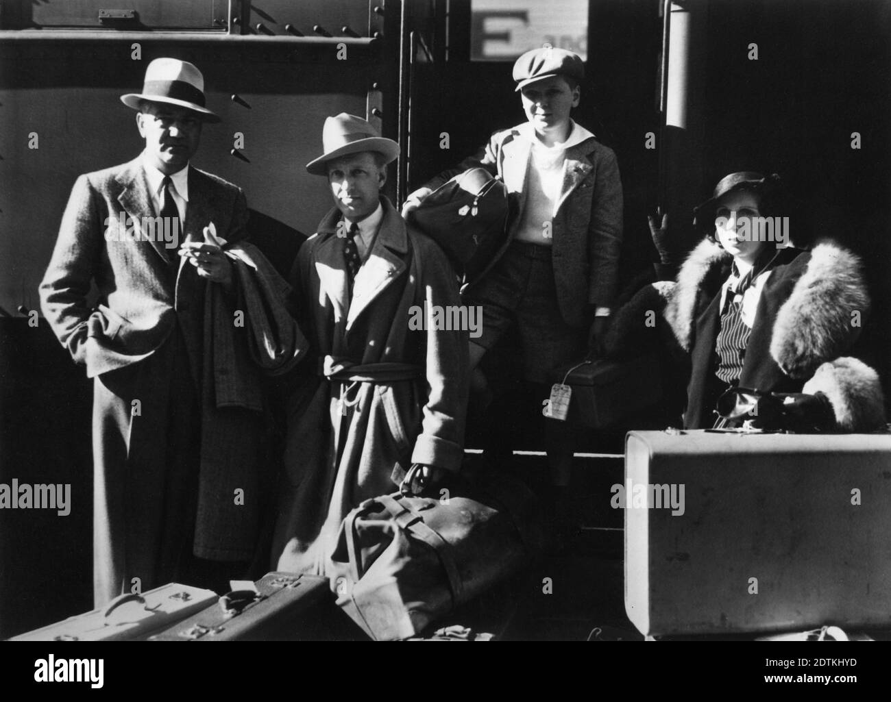 Director VICTOR FLEMING OTTO KRUGER JACKIE COOPER and his Mother arriving at San Francisco for location filming in Oakland California for TREASURE ISLAND 1934 director VICTOR FLEMING screenplay John Lee Mahin novel Robert Louis Stevenson Metro Goldwyn Mayer Stock Photo