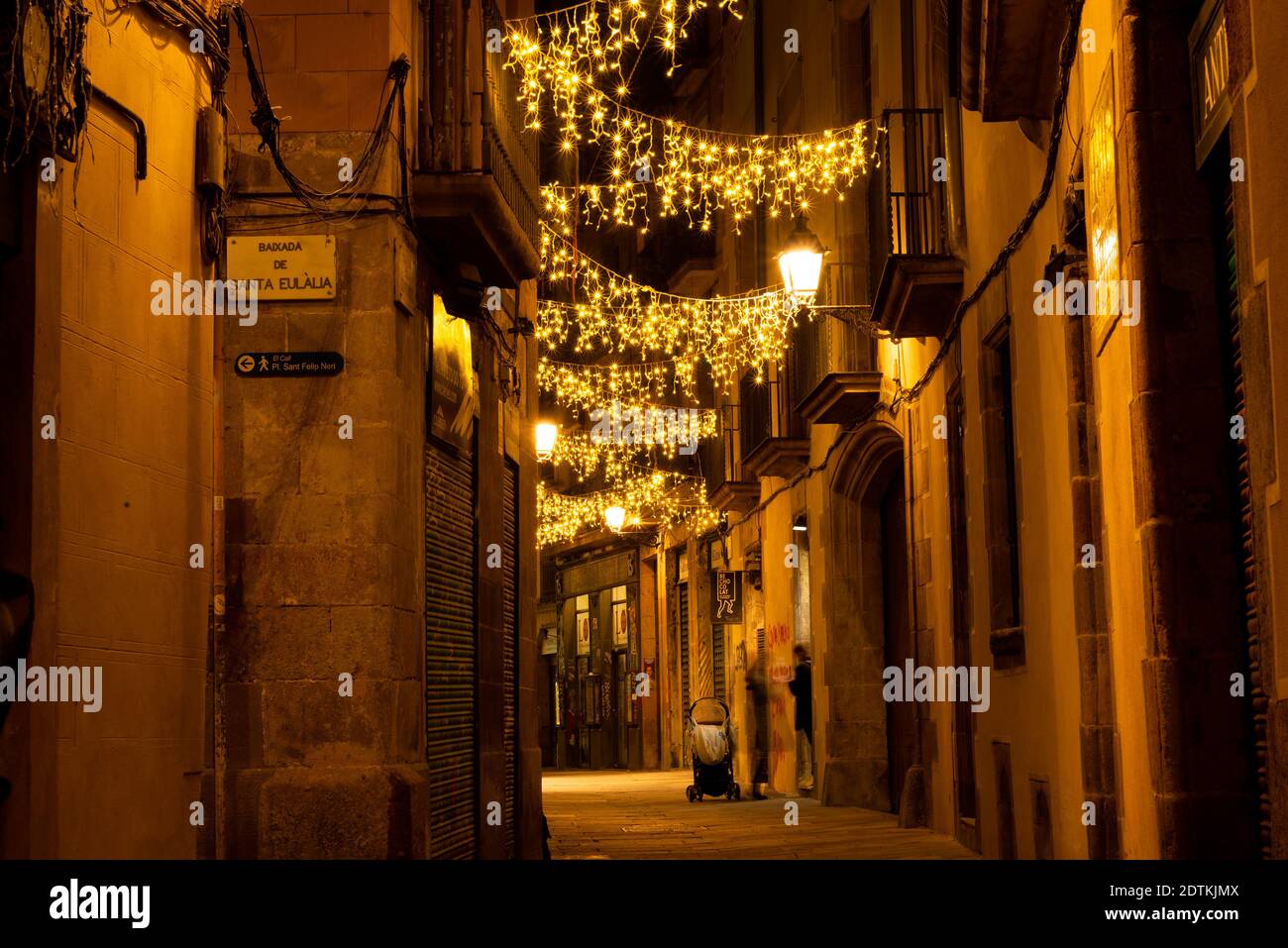 barcelona, spain - 21 december 2020: empty street christmas in barcelona at night curfew imposed for covid-19 crisis. concept of canceled christmas an Stock Photo