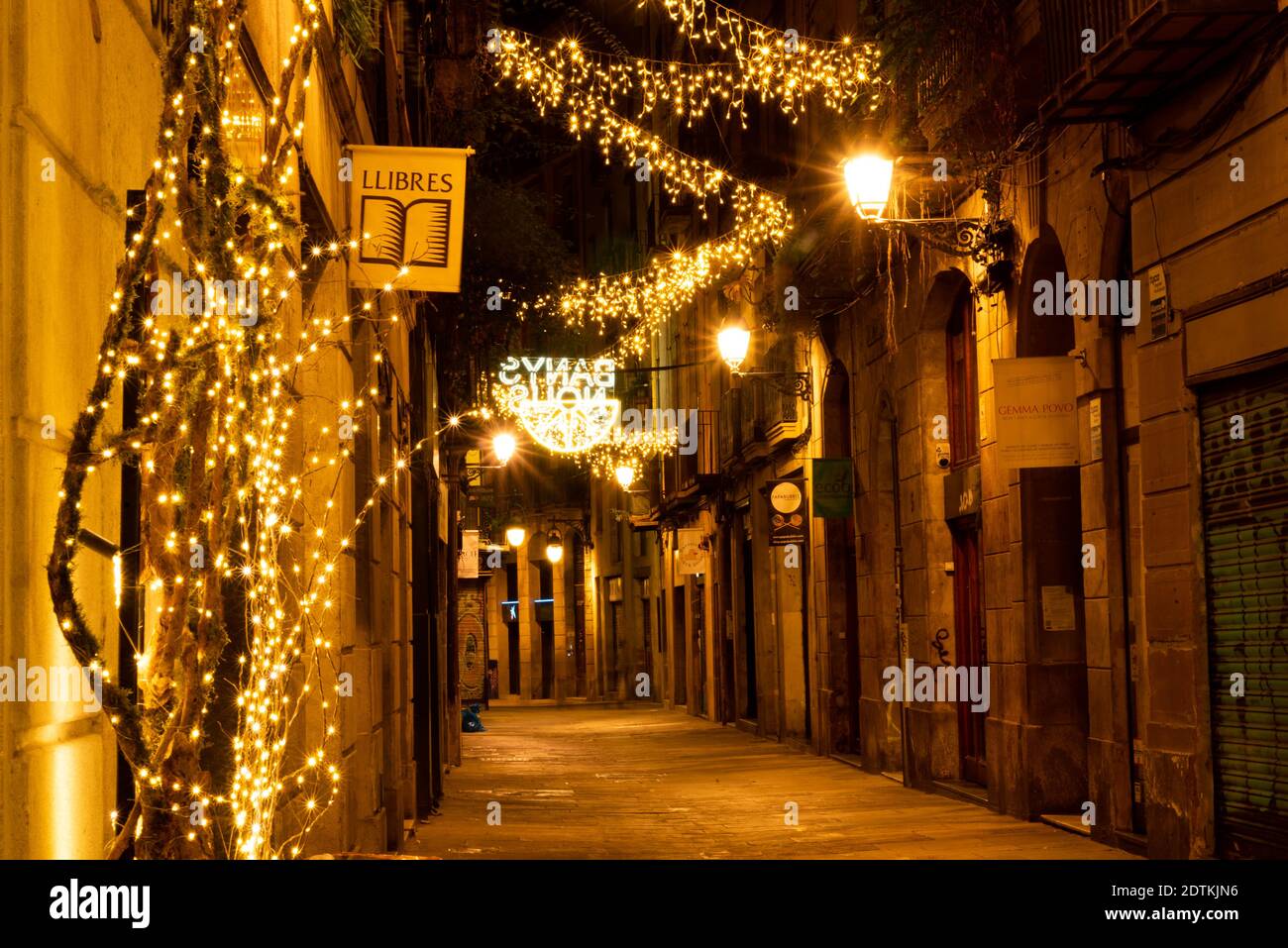 barcelona, spain - 21 december 2020: empty street christmas in barcelona at night curfew imposed for covid-19 crisis. concept of canceled christmas an Stock Photo