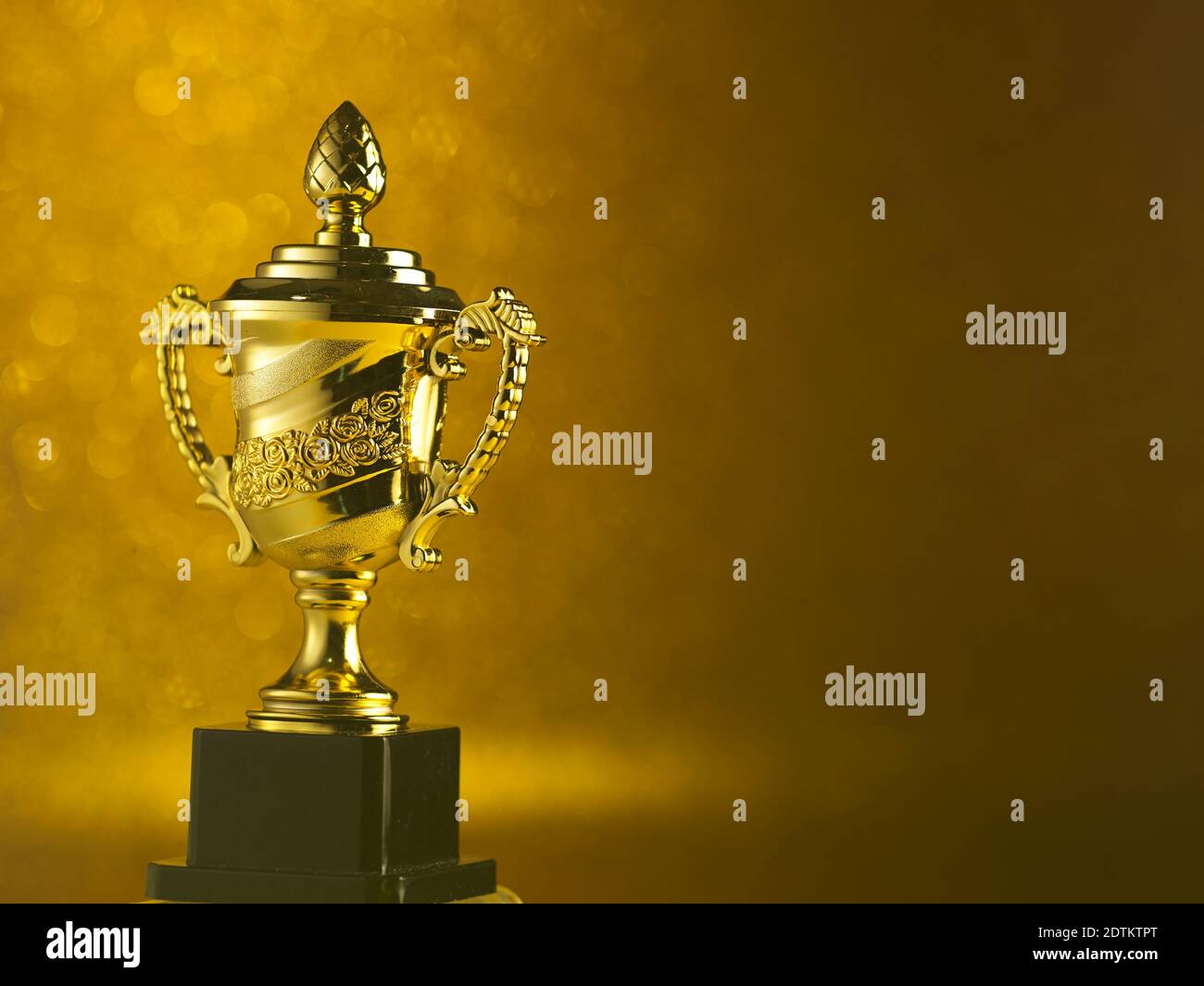 Close-up Of Trophy Against Yellow Background Stock Photo - Alamy