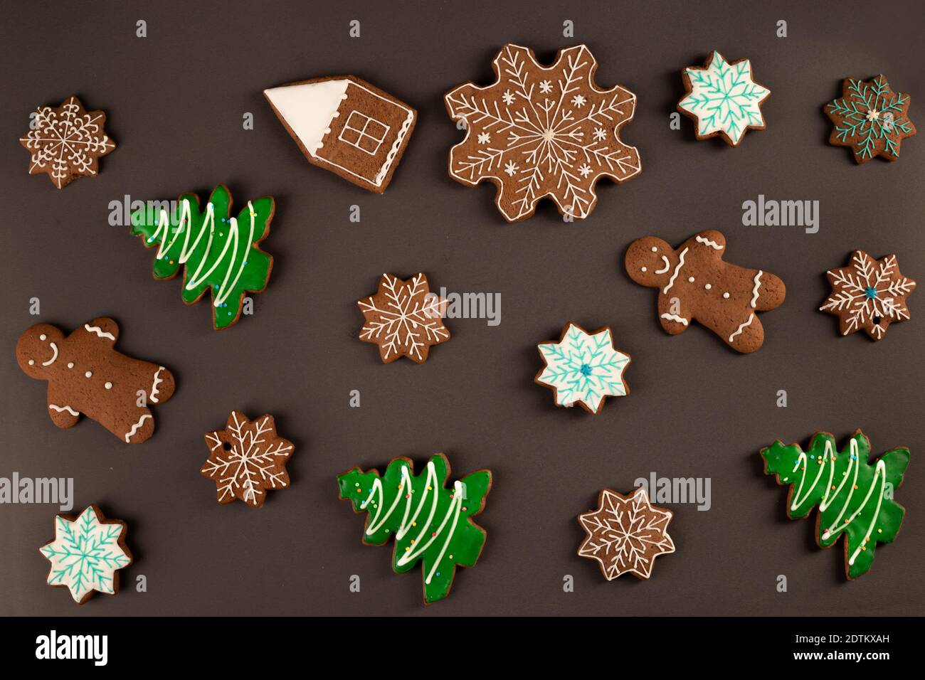 Ginger cookies seamless pattern on brown background Stock Photo
