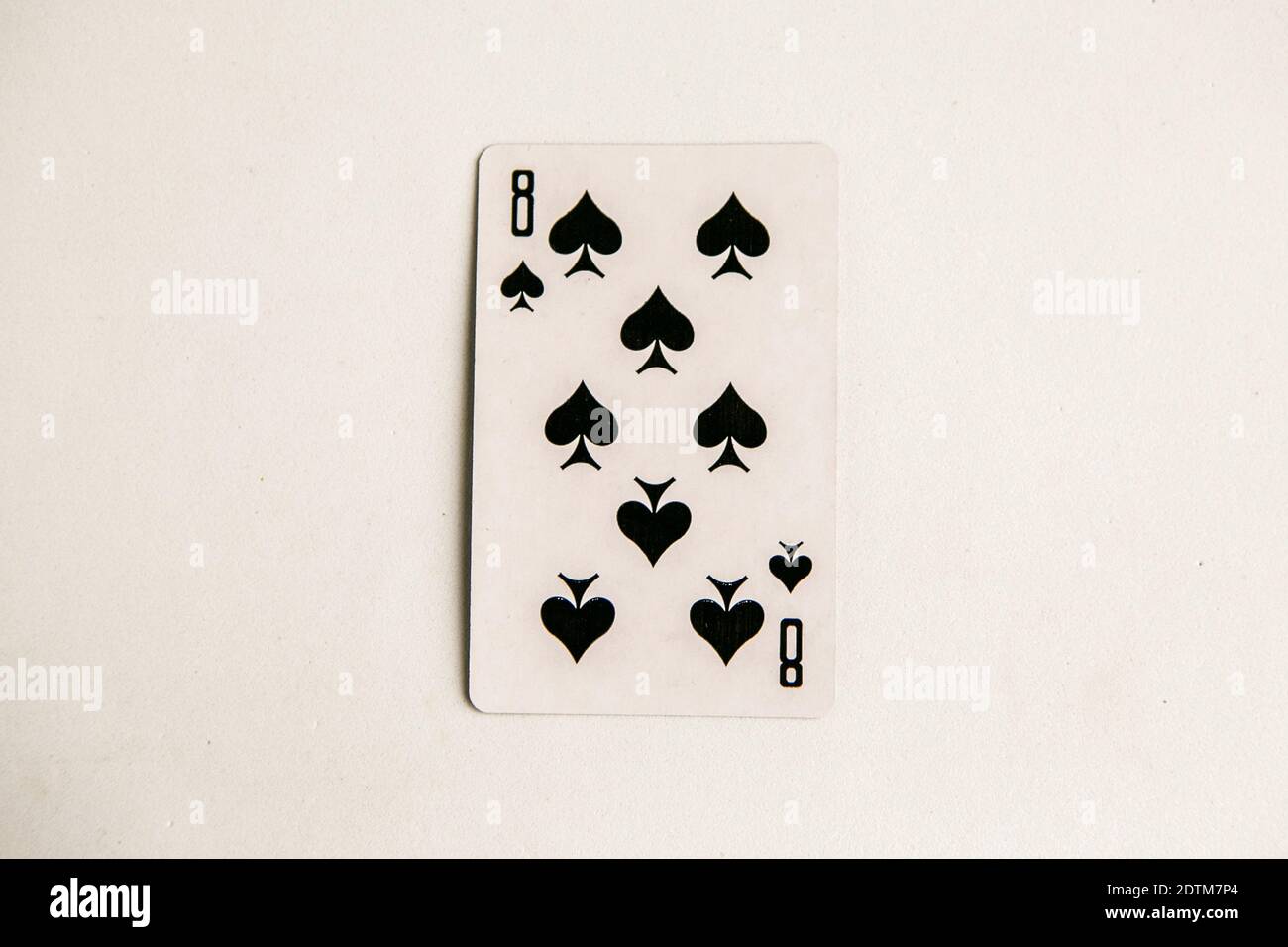 Eight of Spades playing card, white background Stock Photo - Alamy
