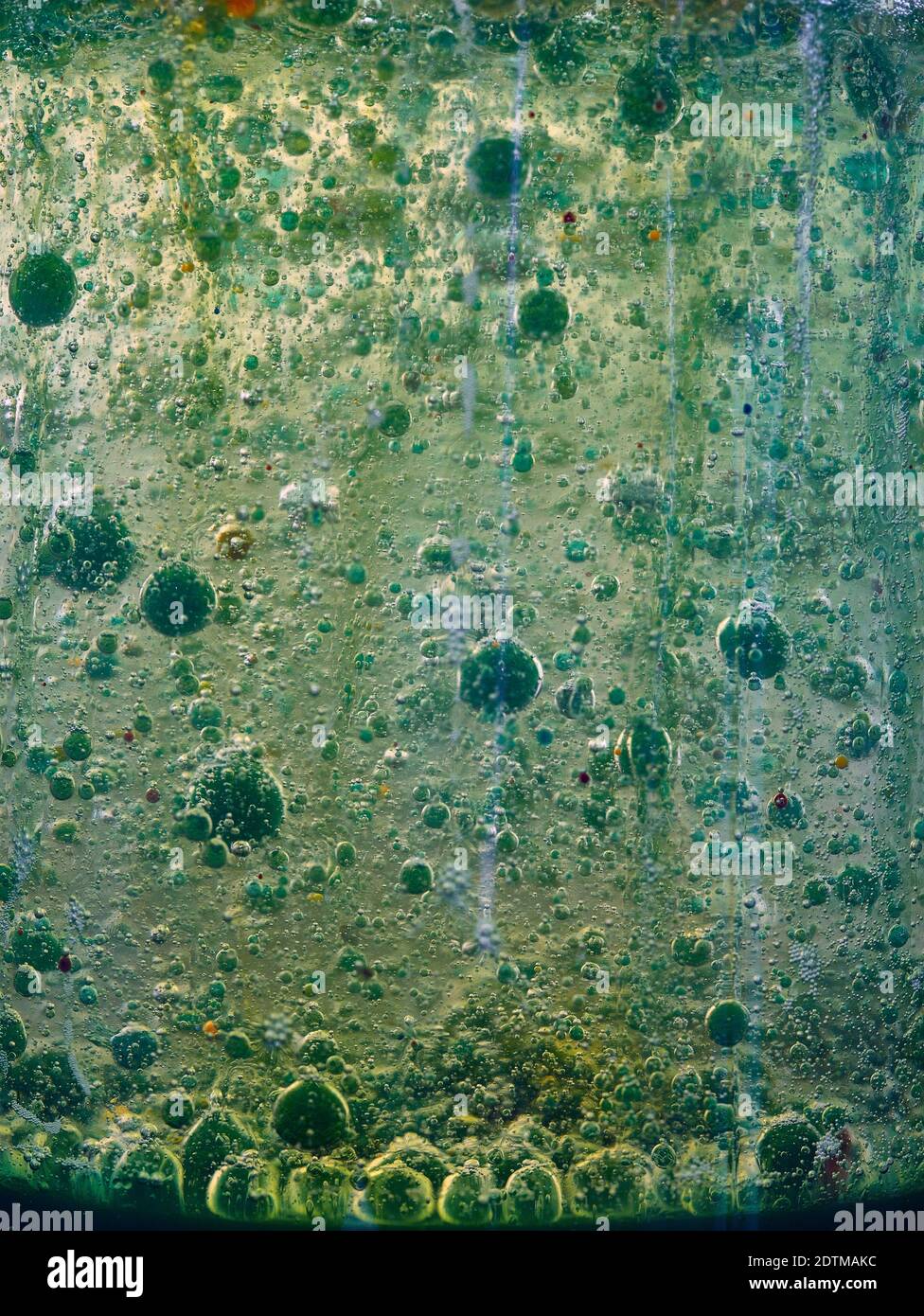 Brightly coloured abstract with bubbles caused by a chemical reaction