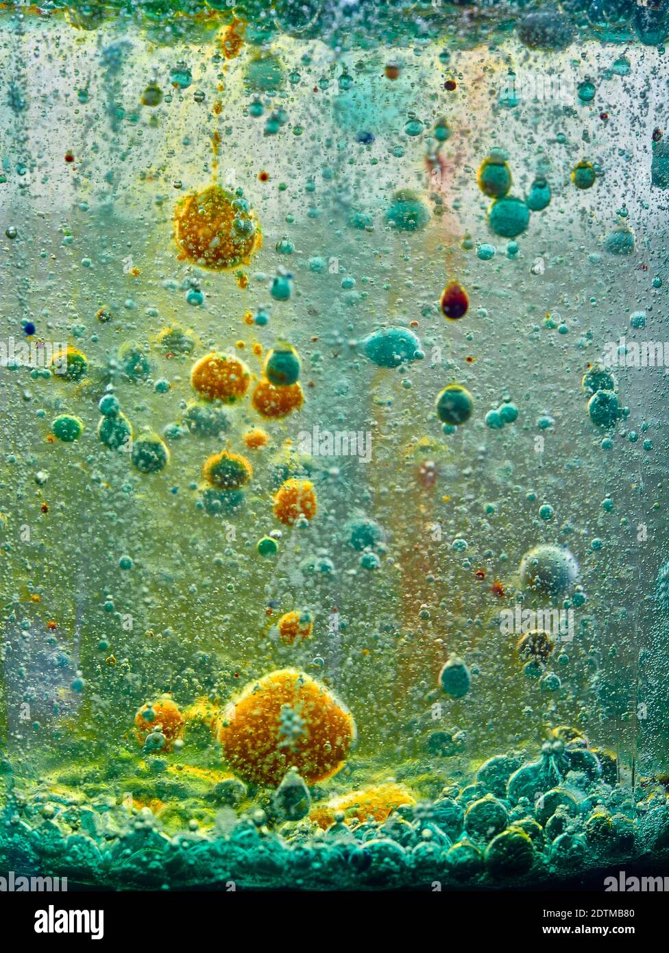 Brightly coloured abstract with bubbles caused by a chemical reaction Stock Photo Alamy