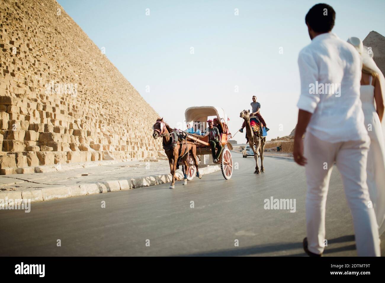 Couple in the Pyramids, Giza, Cairo, Egypt Stock Photo