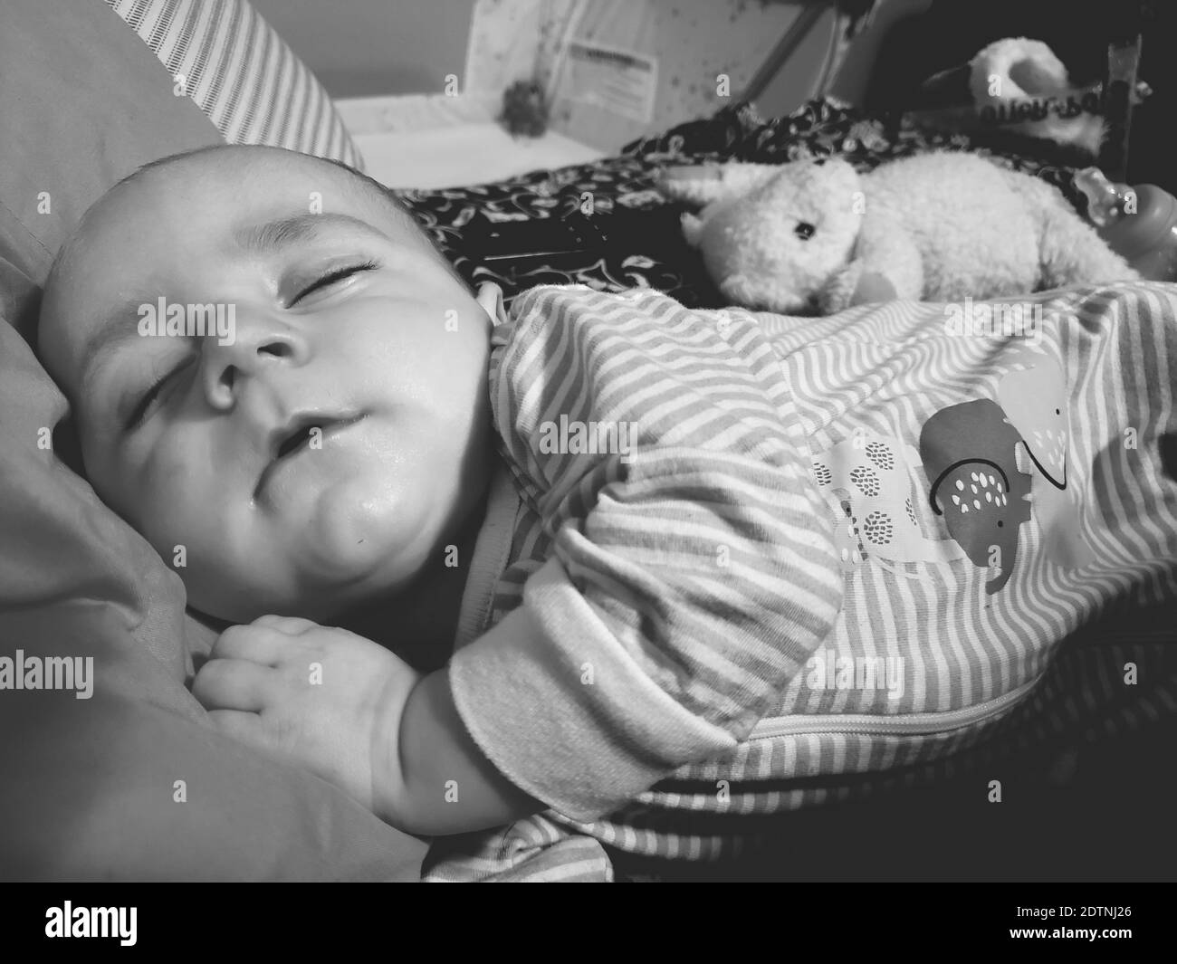 Cute Baby Sleeping On Bed Stock Photo Alamy