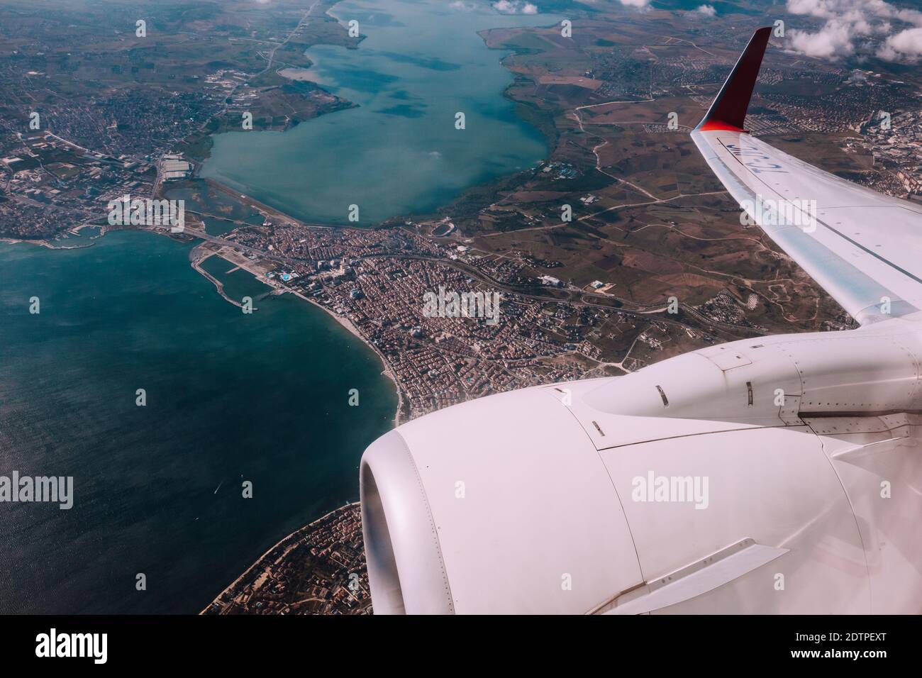 Window view from inside the aircraft during the landing in Istanbul, Turkey Stock Photo