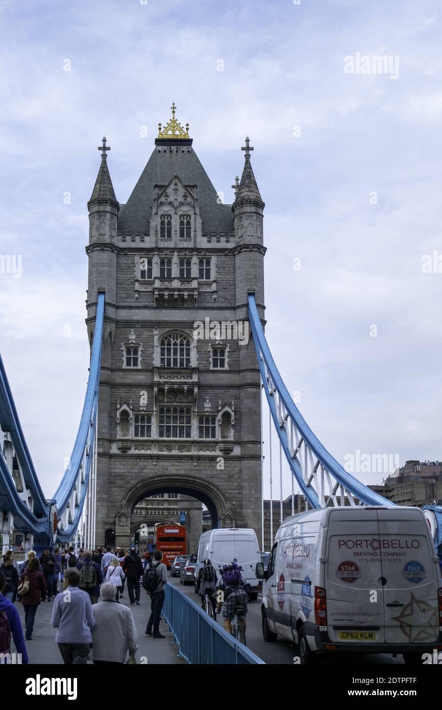 LONDON, UNITED KINGDOM - Aug 27, 2014: The wonderful Tower Bridge by Sir Horace Jones that crosses the Thames in London as seen from the walkway. Stock Photo