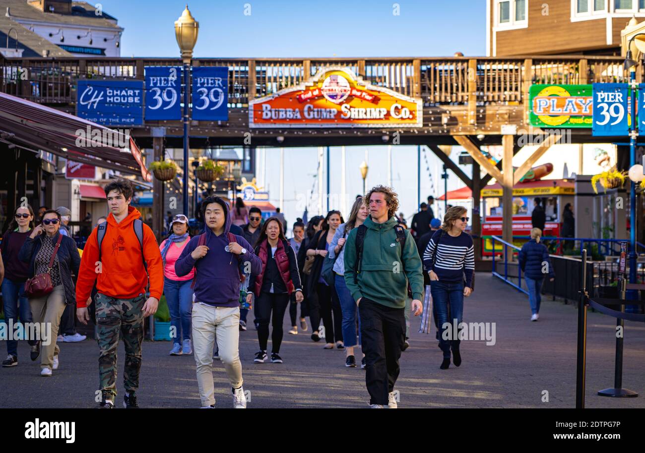 Pier 39 is a shopping center and popular tourist attraction in San Francisco that draws millions of tourists every year. Stock Photo
