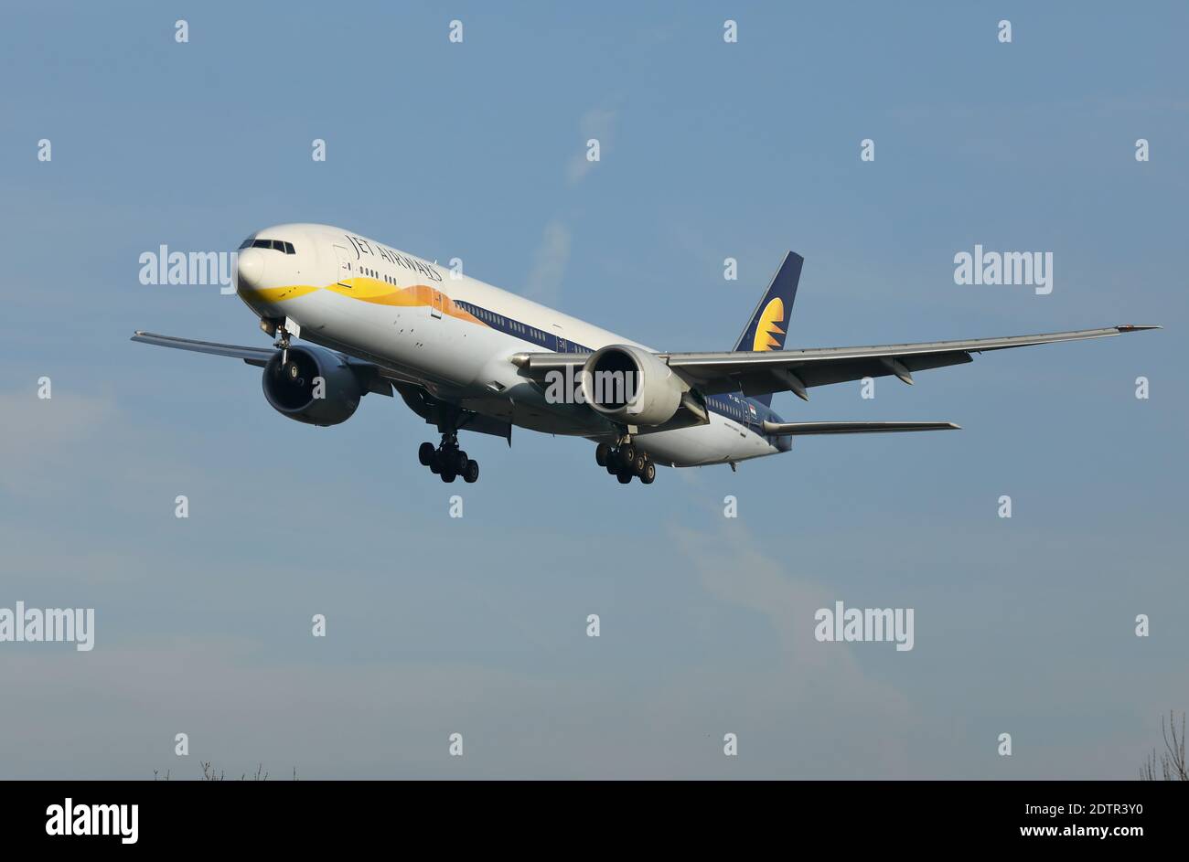 Jet Airways Boeing 777 passenger airliner, serial no. VT-JEQ, landing at Heathrow airport, London, UK, in January, 2019. Stock Photo