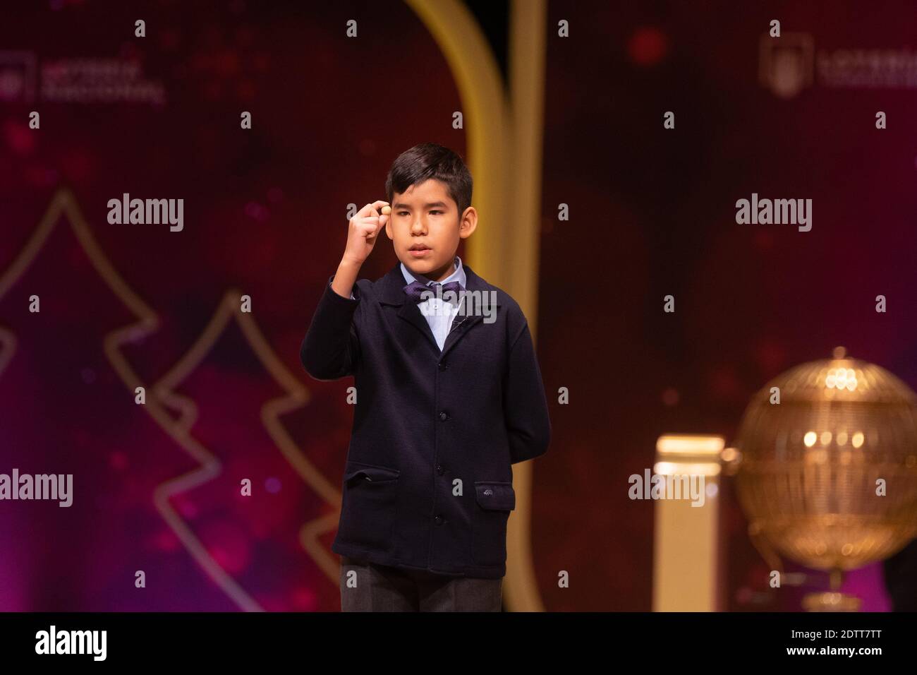 Madrid, Spain. 22 December, 2020: Pupils of the San Ildefonso school sing  numbers with a fifth prize valued at 60,000 euros during the draw of  Spain's Christmas lottery named 'El Gordo' (Fat